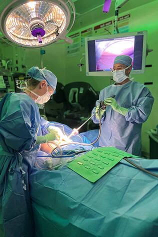 Two cardiothoracic surgeons performing surgery